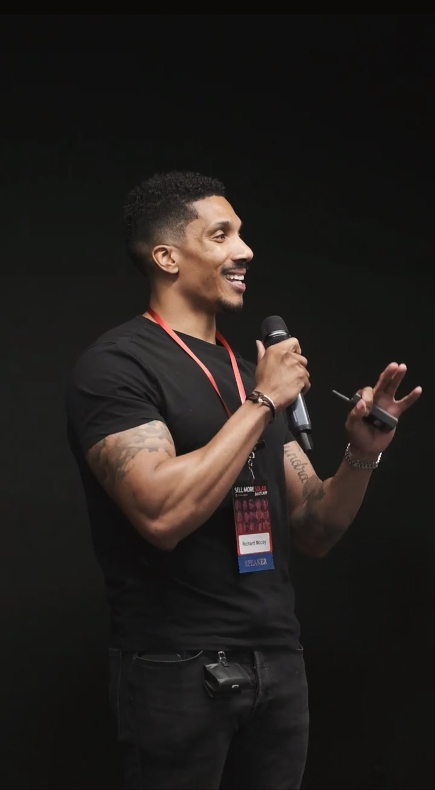 Rich McCoy, founder of Capacity, speaking on stage