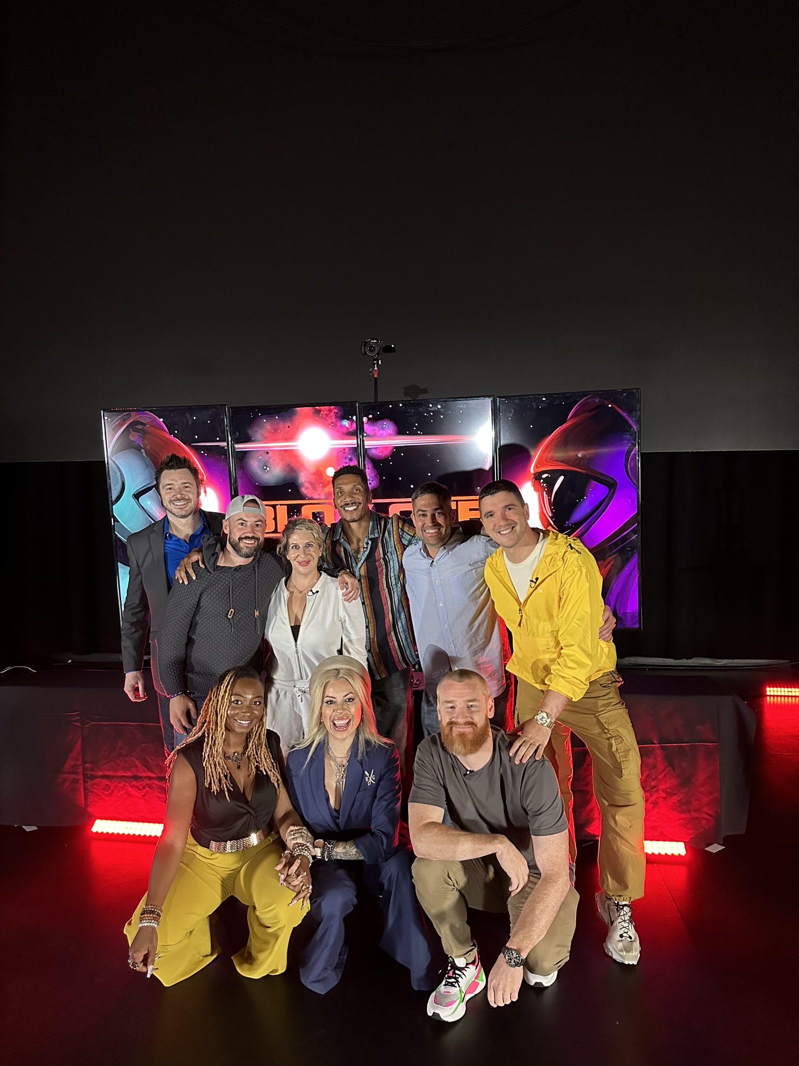Rich McCoy with the cast of the business consulting series